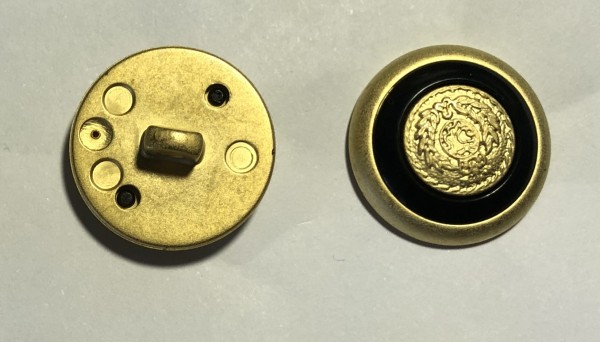 Kunststoffknopf goldfarben mit "Wappen"